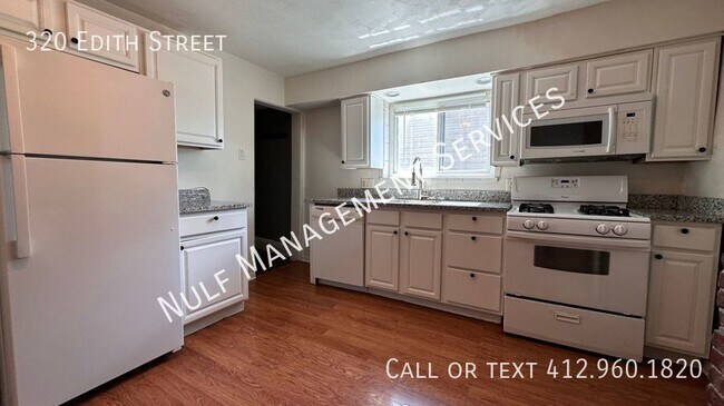 Building Photo - Adorable & Updated 2Bed/1.5Bath Single Fam...