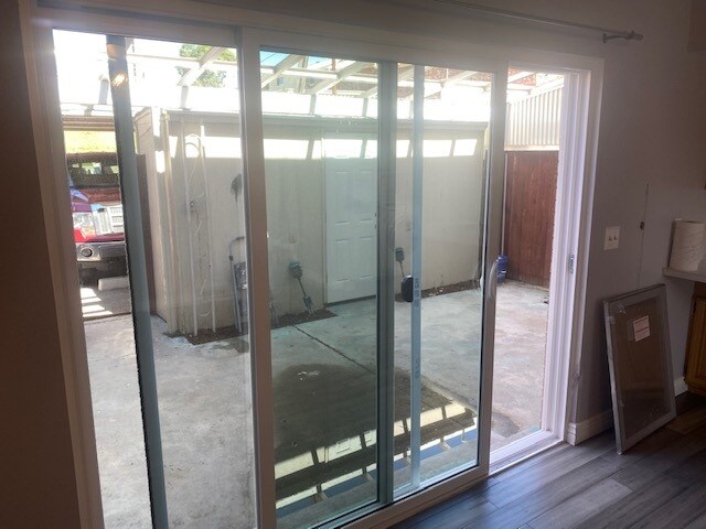 private patio with storage area next to 2 car carport - 8775 Santa Fe Dr
