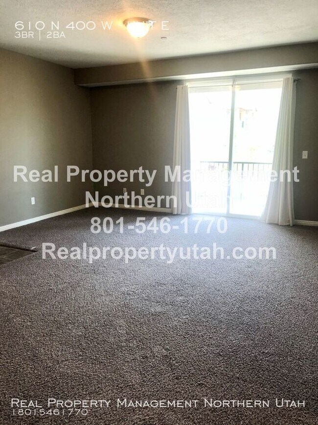 Building Photo - Charming condo- now available!