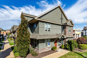 Building Photo - The Cottages on Campus