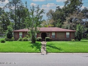 Building Photo - 6982 Madrid Ave