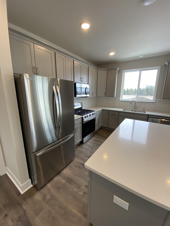 Building Photo - W218N16014 Tiger Lily Dr