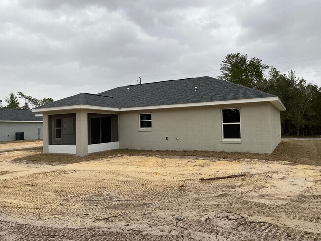Building Photo - Custom Home - Desirable SW Ocala Neighborhood 3/2/2 - $250 off first months rent