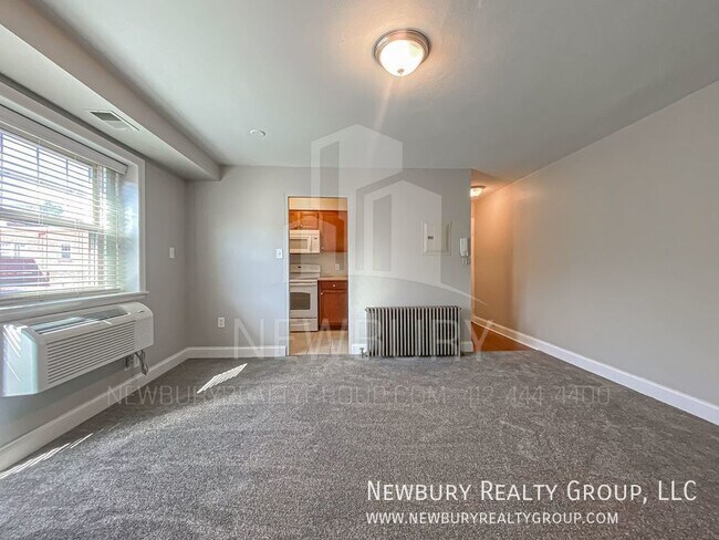 Building Photo - Charming, Bright, and Ready for YOU!