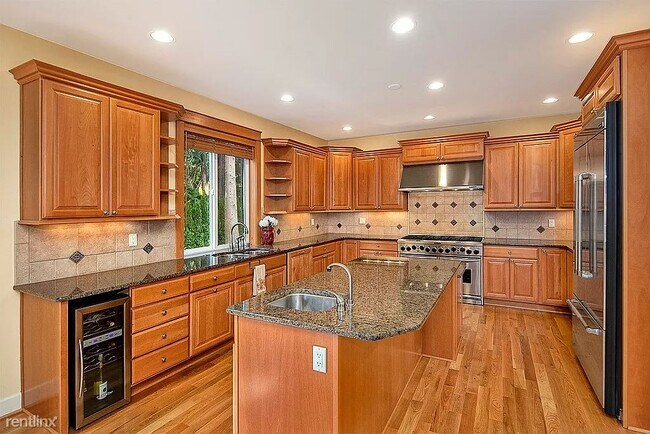 Building Photo - 4 br, 3.5 bath House - 4540 108th Avenue N...