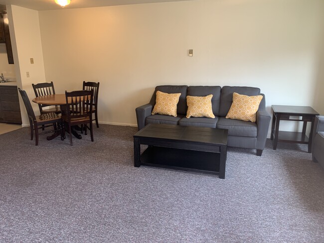 partially furnished living and dining - 258 California Blvd