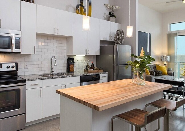 Building Photo - Elevate Your Austin Life | Enjoy Up to 6 W...