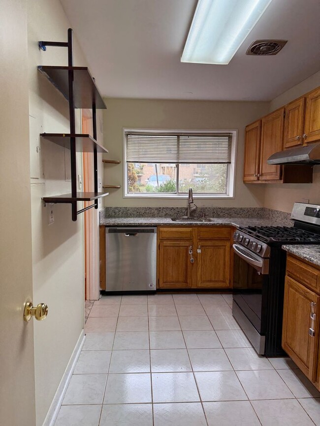 Building Photo - Commuter’s Dream! Large 2BR/2BA Condo Steps from Metro – All Utilities Included!