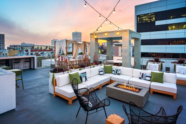 Sunset Splendor: Riva's Rooftop Deck - Riva