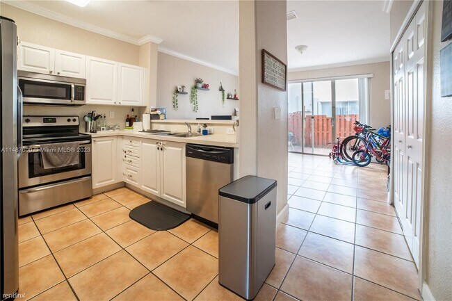 Building Photo - 3 br, 2.5 bath House - 5580 NW 107th Ave A...