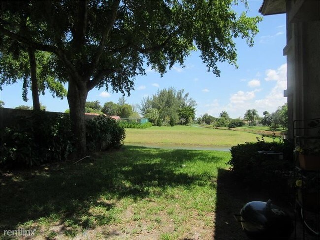 Building Photo - 10570 Royal Palm Blvd