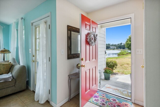 Building Photo - 2/2, Lake Front Villa! Gated Community! Op...