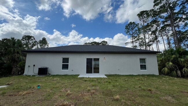 Building Photo - AWESOME 3 Bedroom, 2 Bathroom Home in Palm...