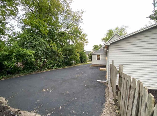 Blacktop driveway - 315 Naymut St