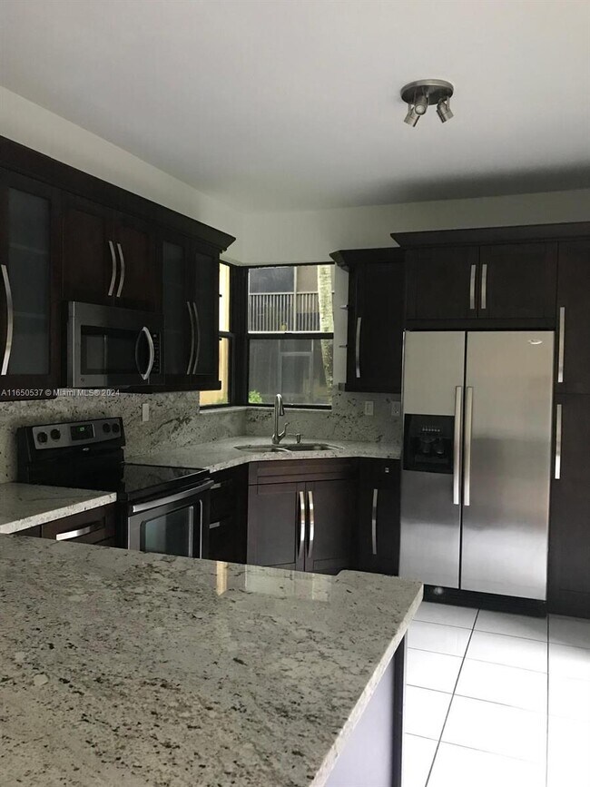 15563 N Miami Lakeway Unit 10717, Miami Lakes, FL 33014 Condo for