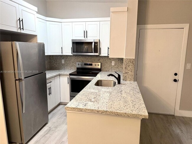 Foto del edificio - 9719 Hammocks Blvd