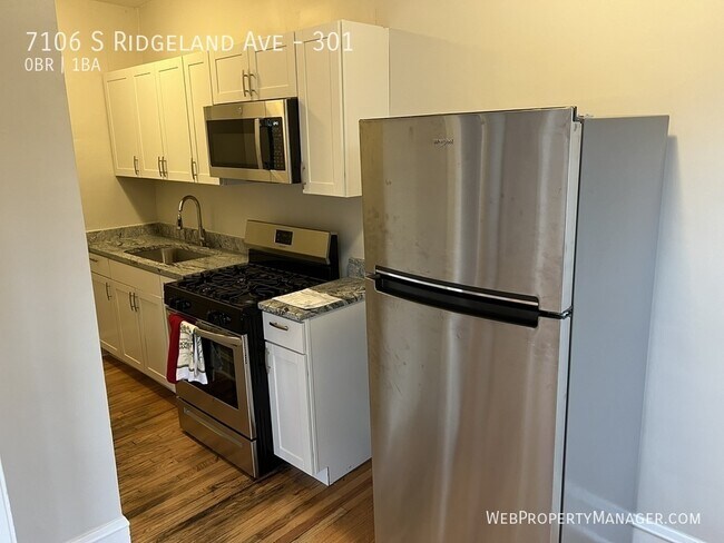 Foto del edificio - 7106 S Ridgeland Ave
