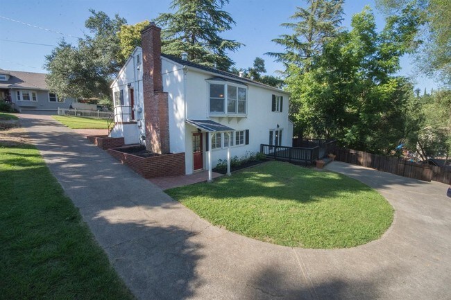 very long driveway offers privacy and could allow additional parking on side - 8060 Sierra St