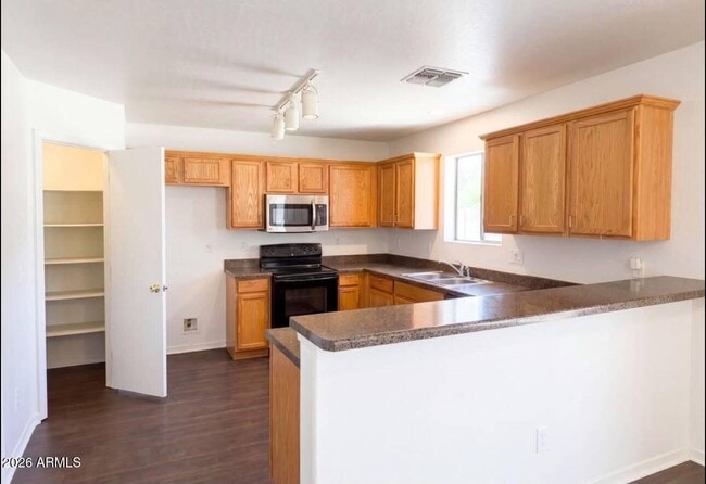 Building Photo - 13976 W Port Royale Ln