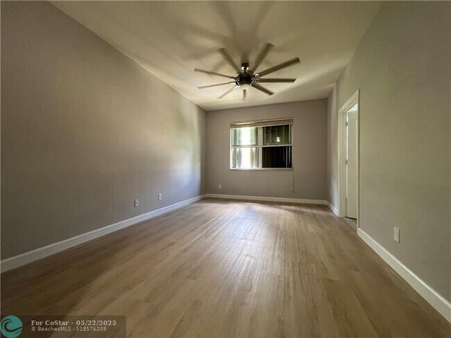 Building Photo - 9428 SW Merlin Ct