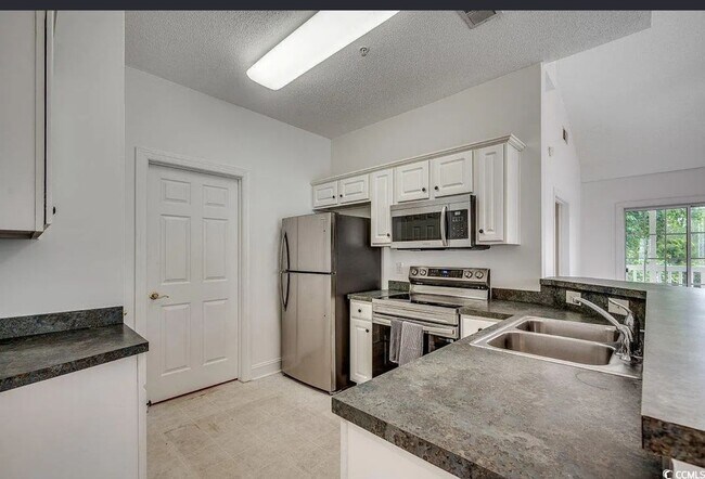 Building Photo - Coastal Living Made Easy – 3BR Condo for Rent