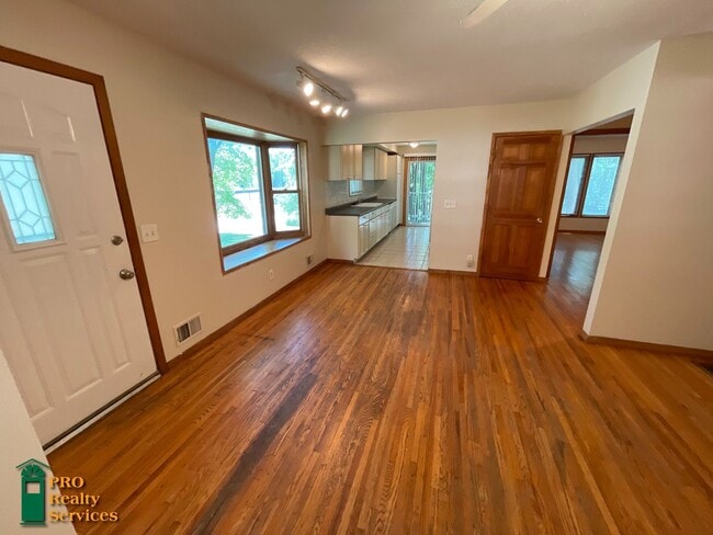 Building Photo - 4 Bedroom Home One Block from Medicine Lake