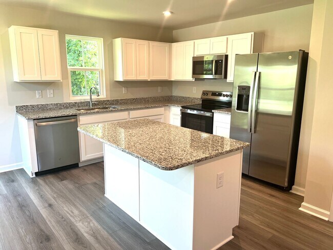 Building Photo - New Three-Bedroom, Two and one-half Bath T...