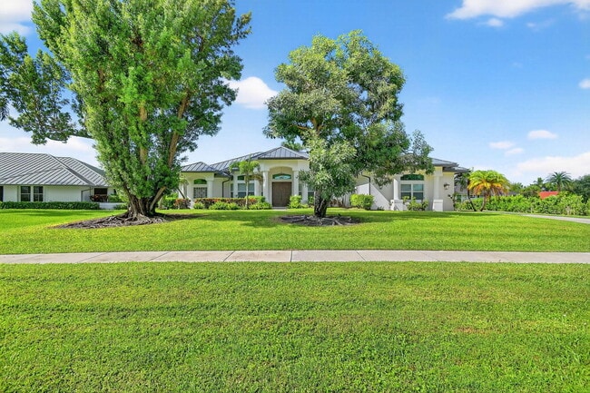 Foto del edificio - 15830 Meadow Wood Dr