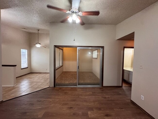 Photo - 2 bed duplex with 1 1/2 baths, bonus room and a 1 car garage for lease in SW OKC! (no fenced yard) House