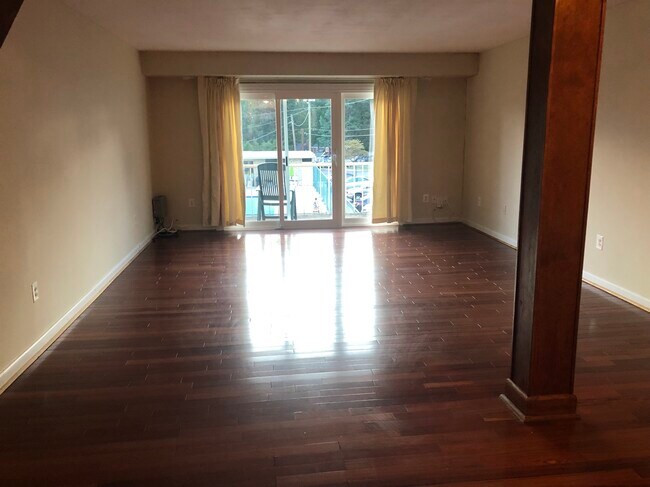 Awesome tenants are needed! Cozy condo with assigned parking and hardwood floors throughout - 3127 University Blvd W
