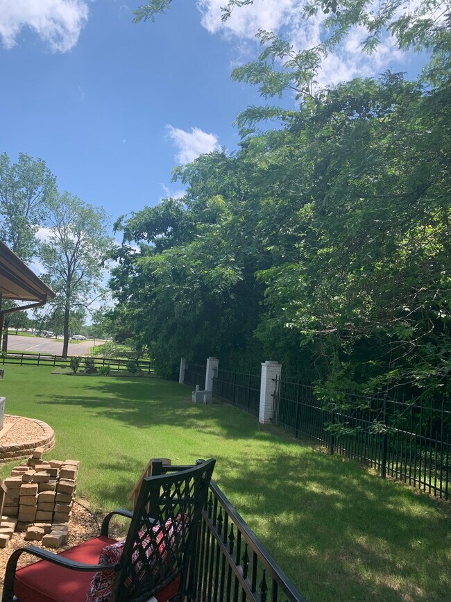 View of Pool area, tennis courts, walking trail, from patio - 614 Cooper Estates Dr