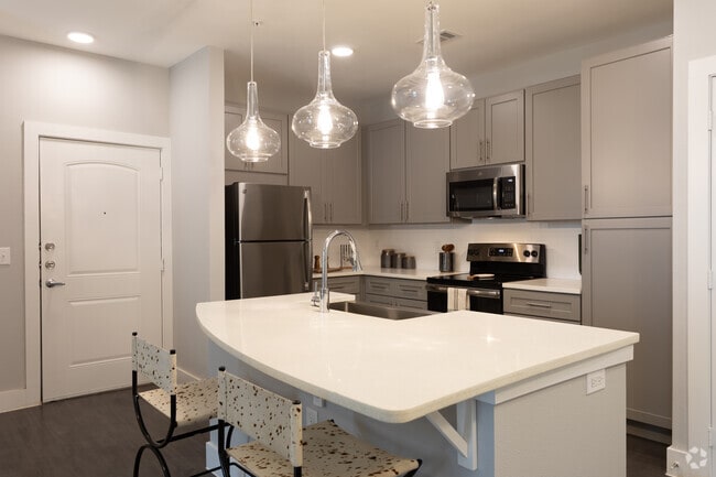 1BR, 1BA - 732SF Wheat - Kitchen - The Woodford on Mockingbird