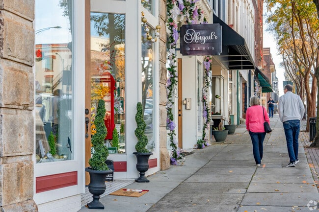 Visitors stroll along the small locally owned business storefronts of Salisbury's Main Street.