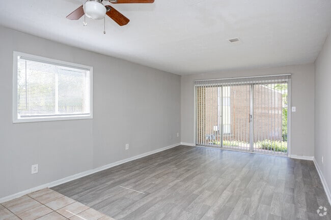 2BR, 1.5BA - 1,032SF - Living Room - Regal Forest Apartments