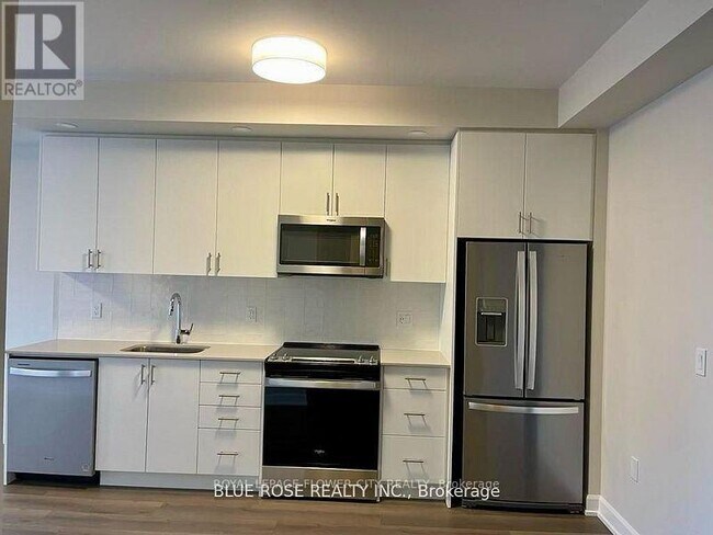 Photo du bâtiment - 3200-3200 William Coltson Ave