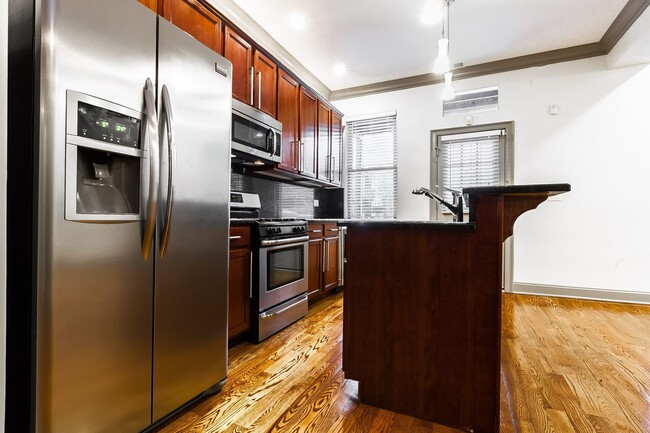 Building Photo - 4627 S Langley Ave