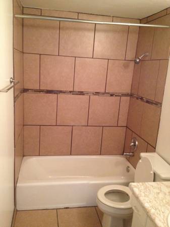 New bath tile - 4858 Izard St