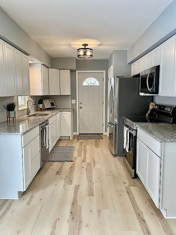 Foto principal - 7042 Logan Ave N