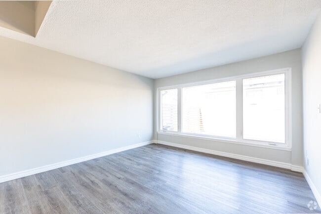 3BR, 2BA - 1,200SF - Living Room - 240-280 Montmorency