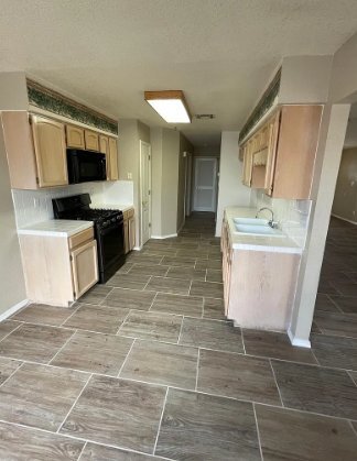 Building Photo - 12133 Desert Quail Ave