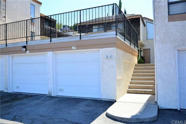 Your own personal garages right as soon as you walk down the stairs - 950 W Lambert Rd