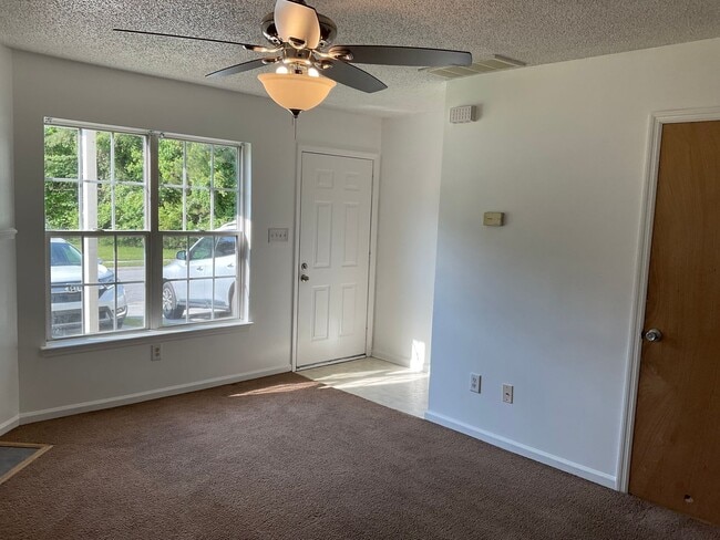 Building Photo - Great two bedroom two and a half bath town home located off of Piney Green Road. Convenient to Ca...