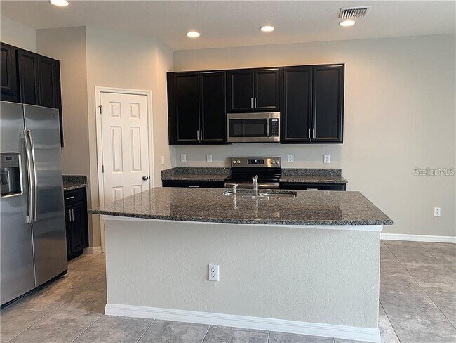 Foto del edificio - 7042 Grand Elm Dr