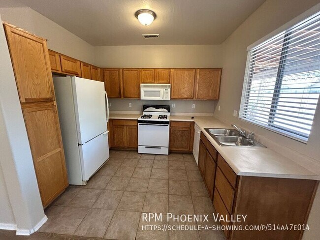 Foto del edificio - 11191 W Palm Ln