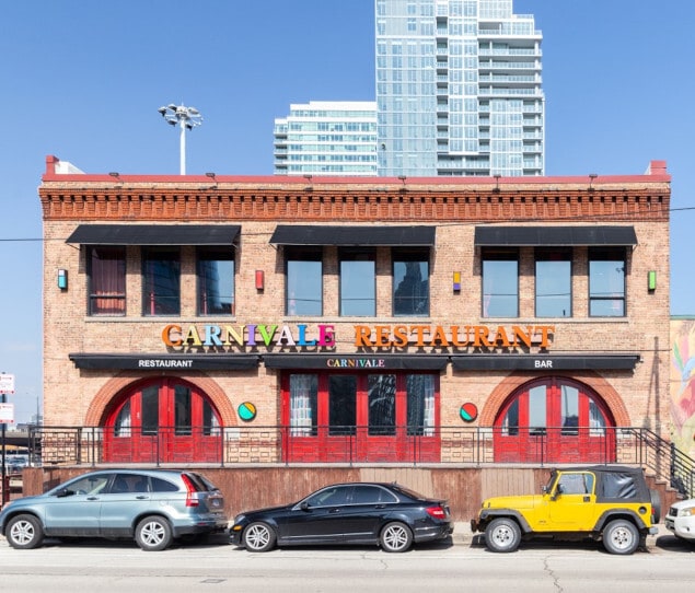 Brightly colored restaurants line the street