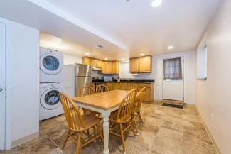 Kitchen table and chairs have been updated - 118 6th Ave