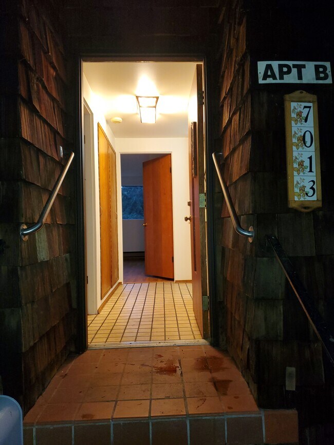 Main entrance at night - 7013 Seaview Terrace SW