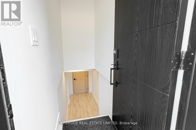 Photo du bâtiment - LOWER 61 MARLIN COURT