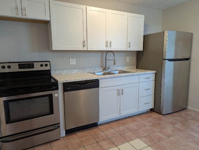 Foto del edificio - Cozy duplex with 3 bedrooms and 2 baths