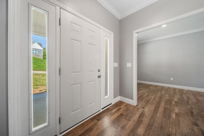 Building Photo - FANTASTIC 4 BEDROOM HOME LOCATED IN KARNS!!